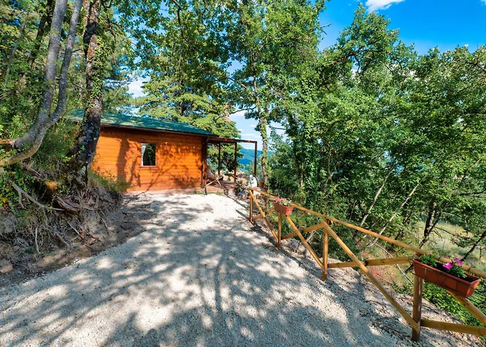 Apartament La Casetta Nel Bosco Asyż